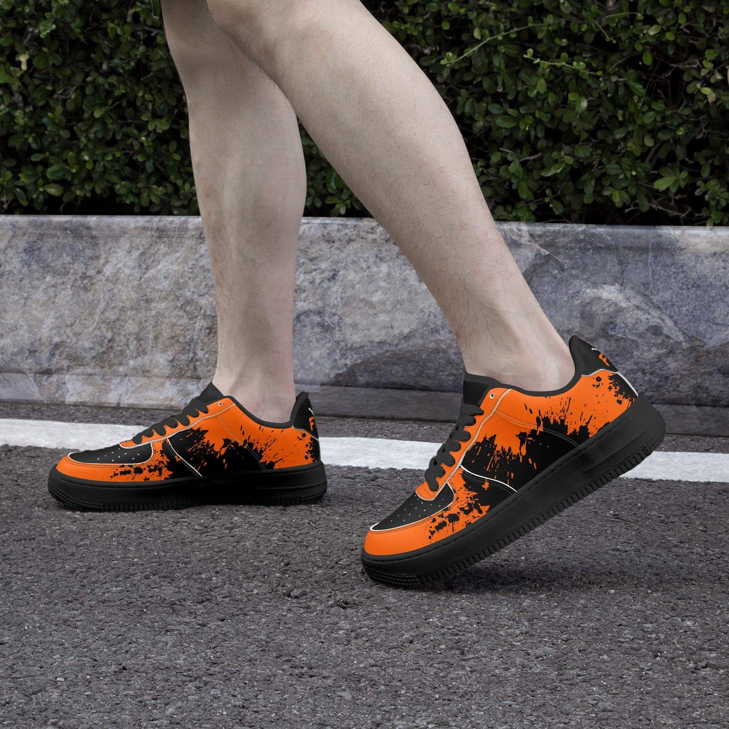 Orange splash black sneaker.