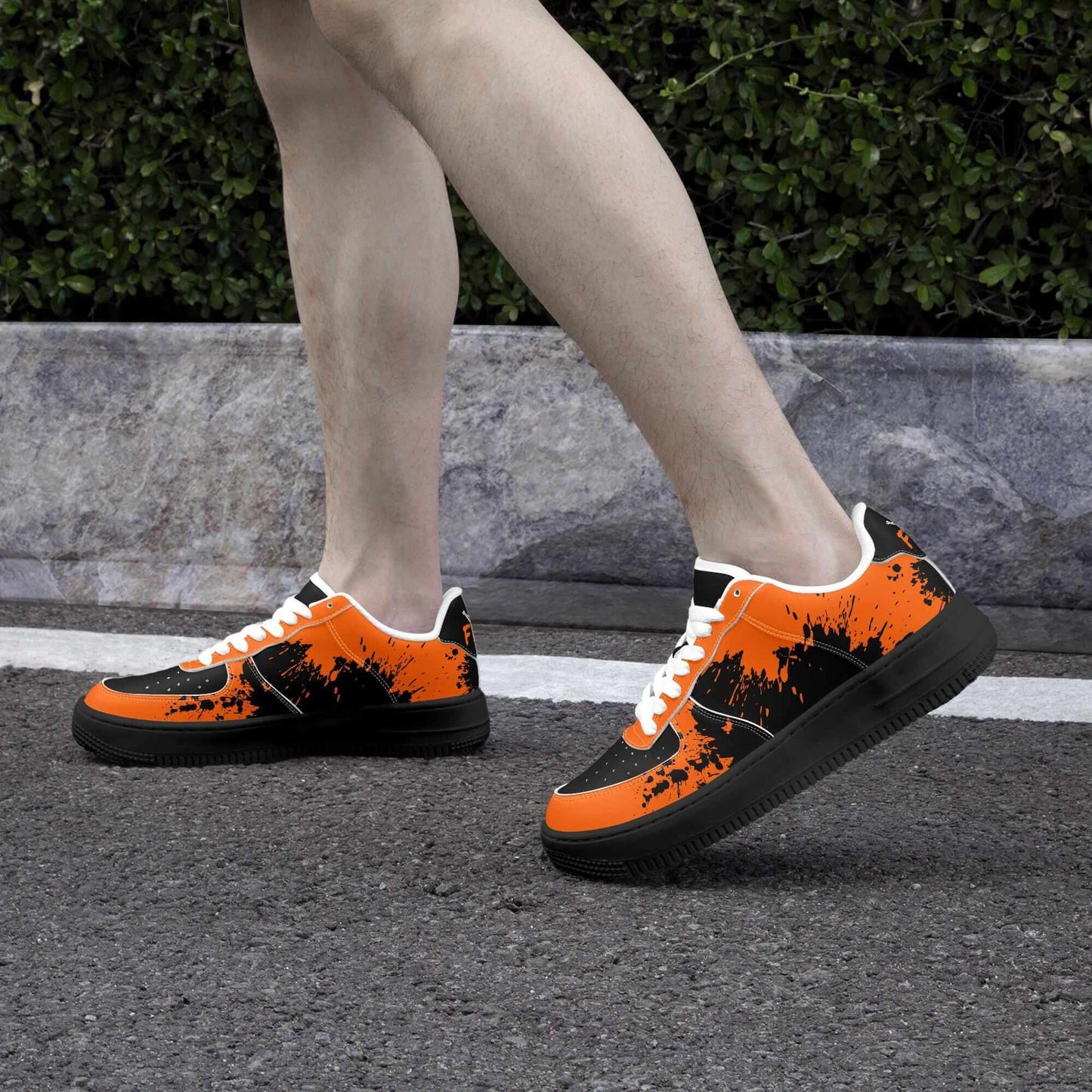 Orange splash black sneaker.